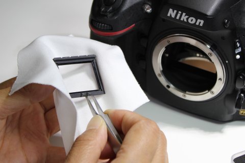 Nikon VAF optical filter being prepared for installation